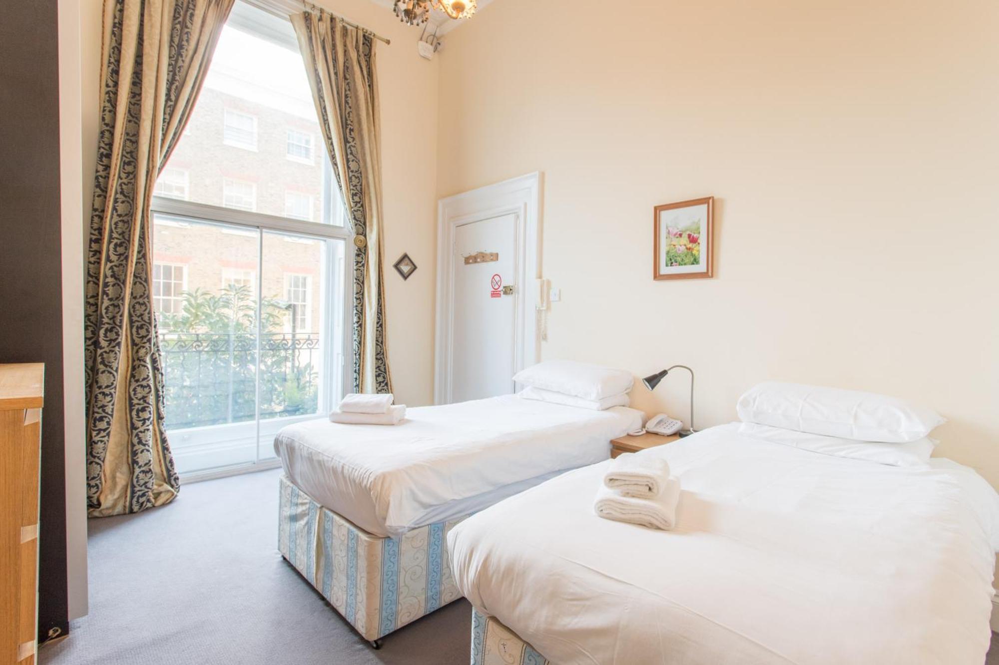 Amber Residence Hotel-Suites Londen Kamer foto