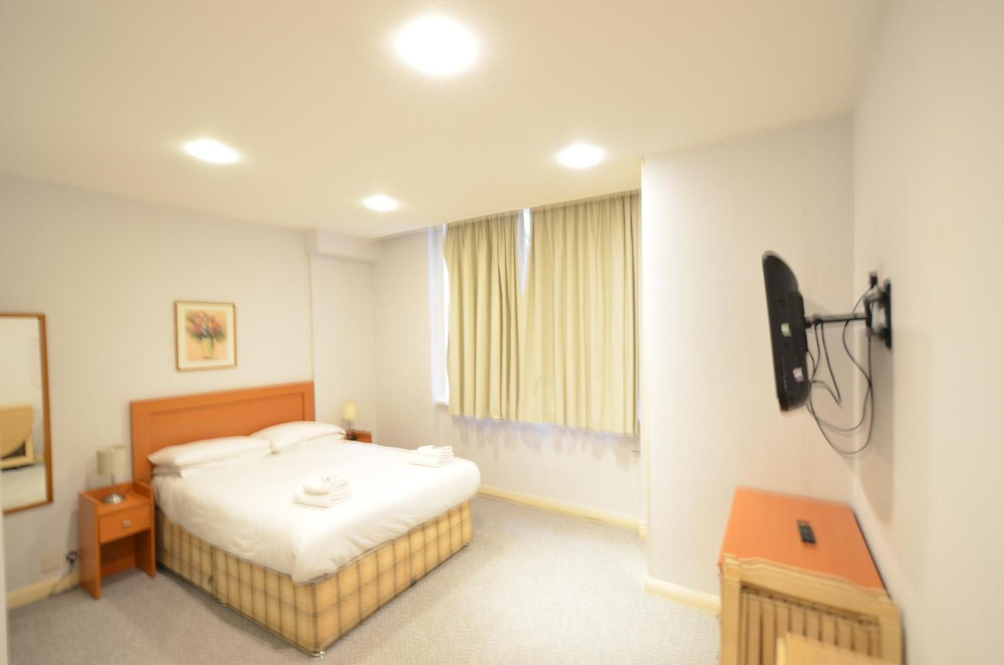 Amber Residence Hotel-Suites Londen Kamer foto