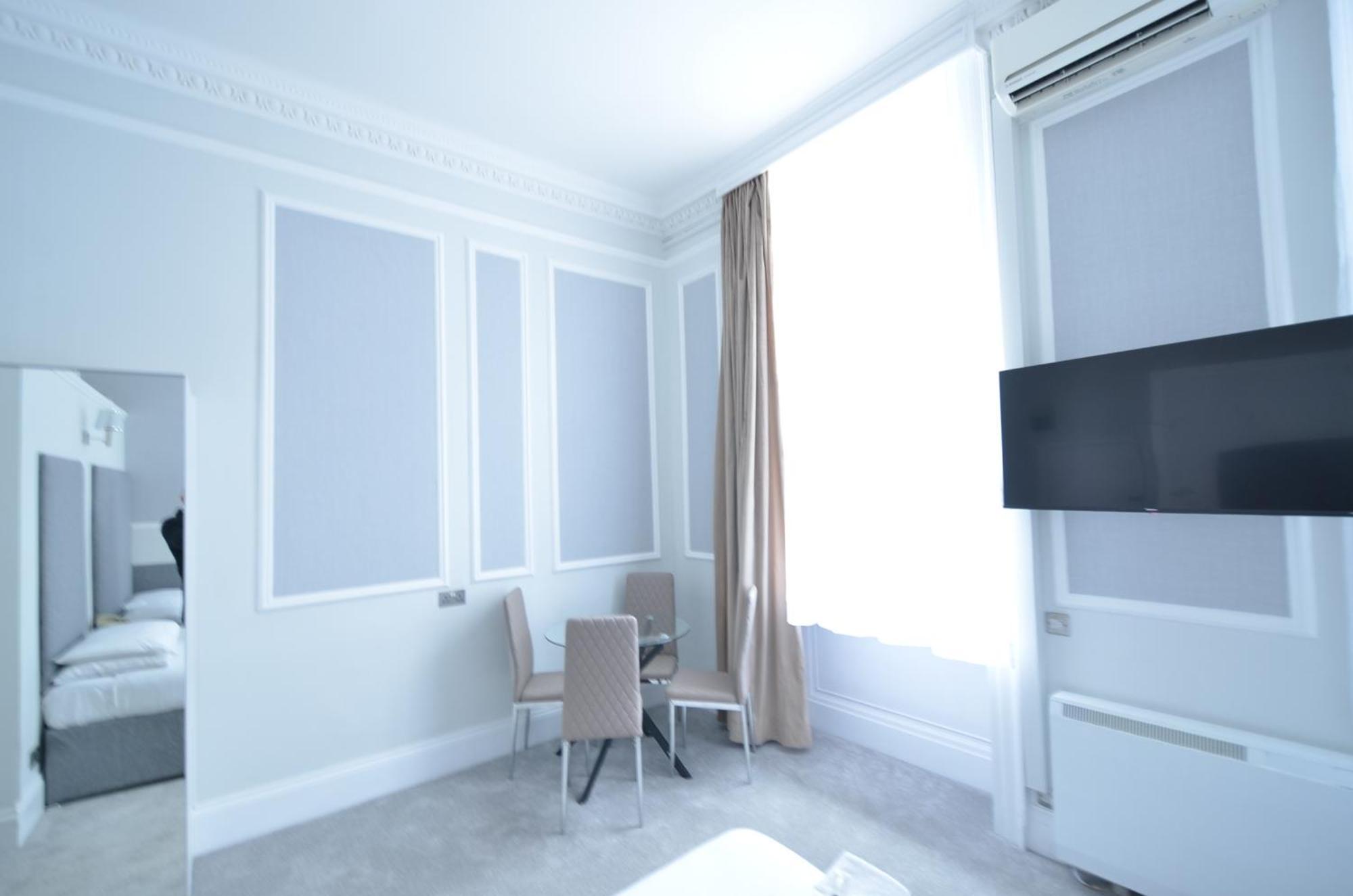 Amber Residence Hotel-Suites Londen Kamer foto
