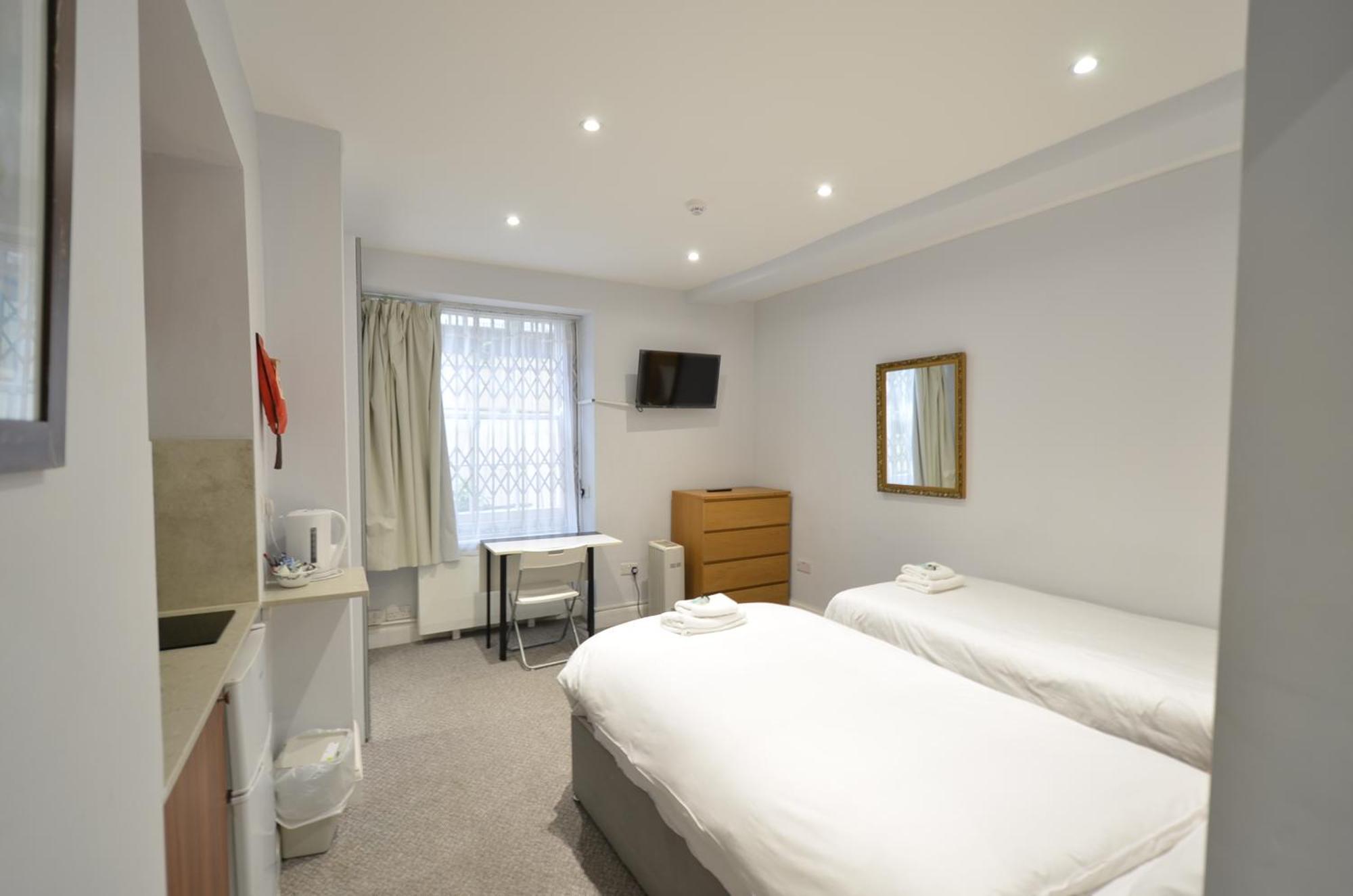Amber Residence Hotel-Suites Londen Kamer foto