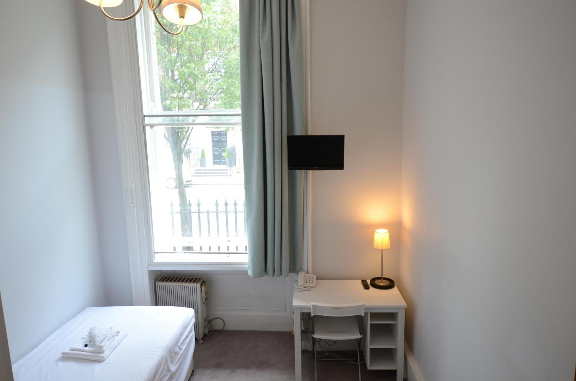 Amber Residence Hotel-Suites Londen Kamer foto