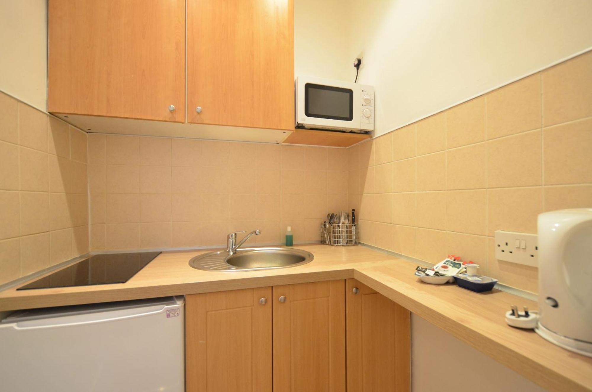 Amber Residence Hotel-Suites Londen Kamer foto