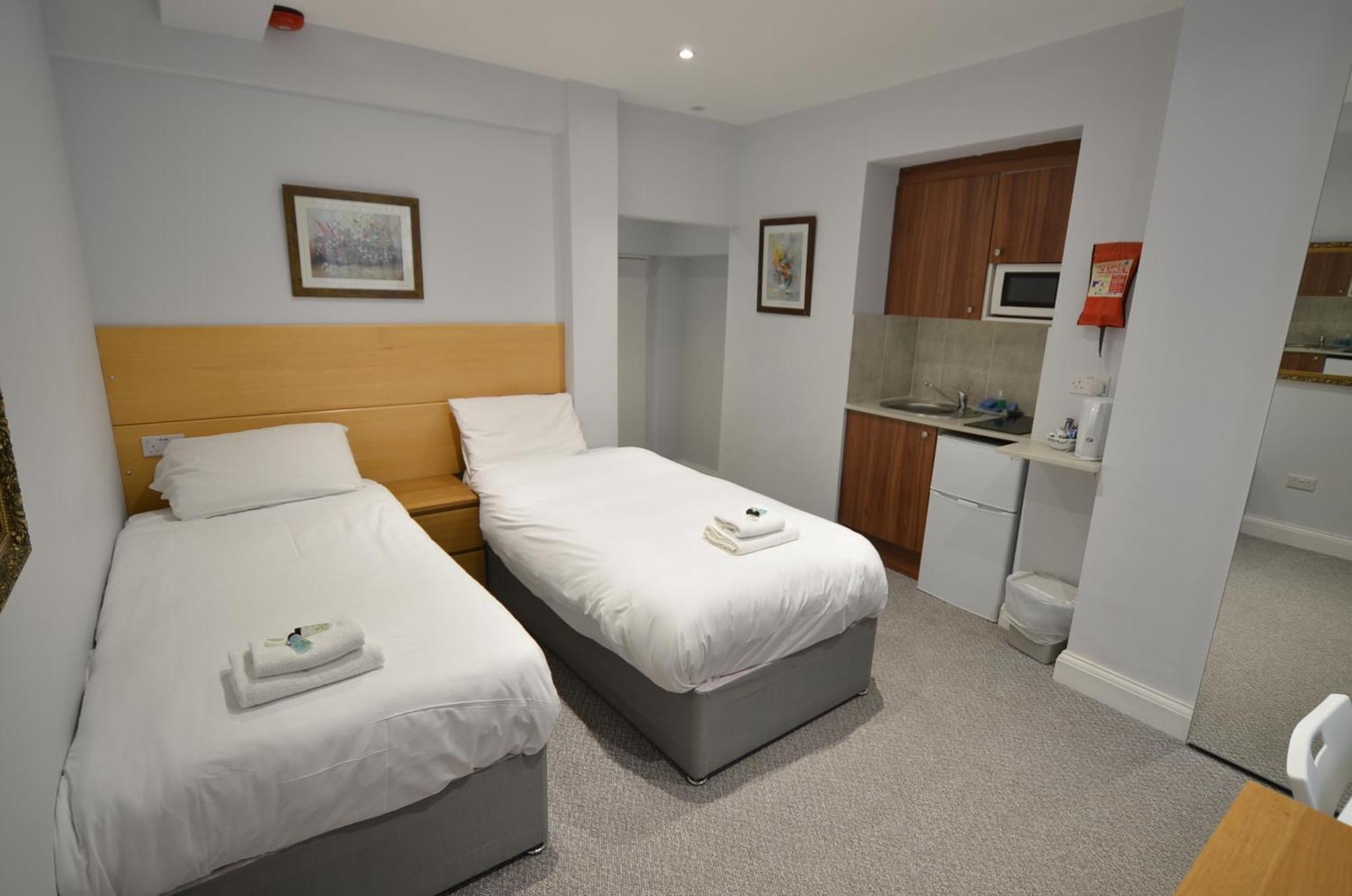 Amber Residence Hotel-Suites Londen Kamer foto