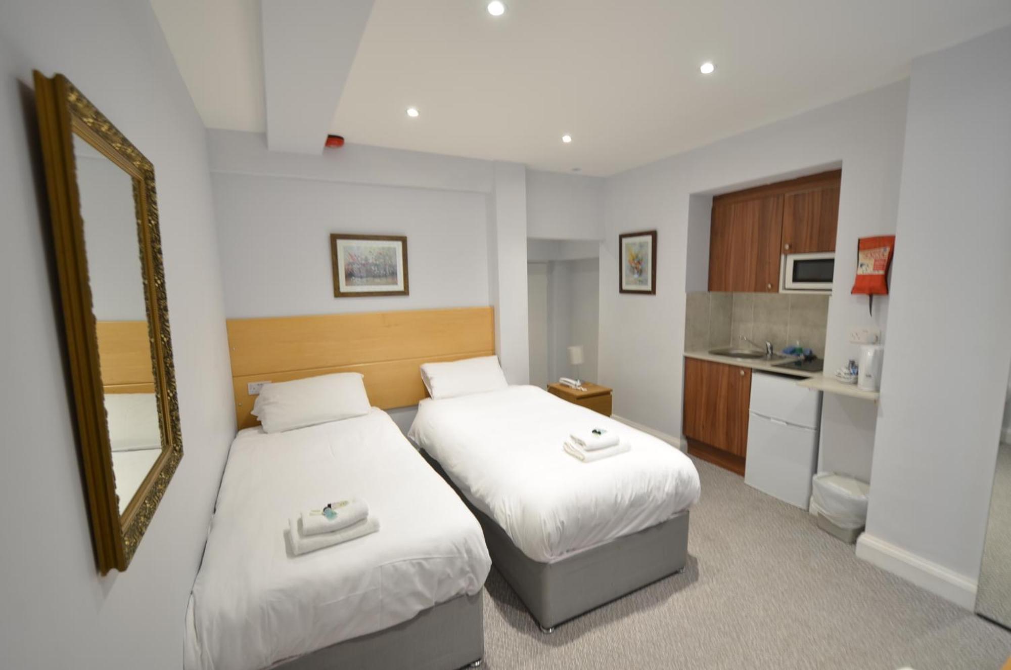 Amber Residence Hotel-Suites Londen Kamer foto