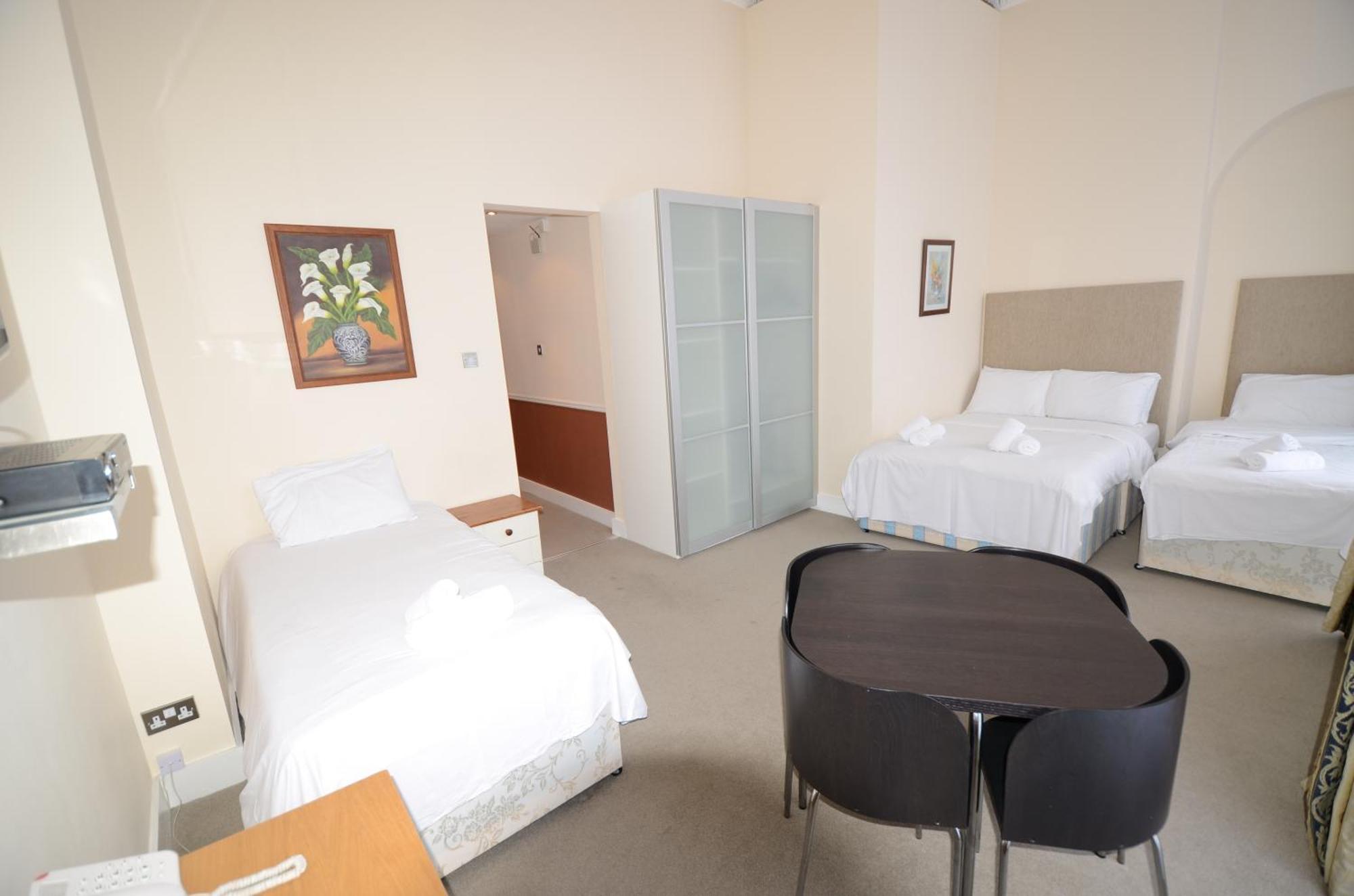 Amber Residence Hotel-Suites Londen Kamer foto