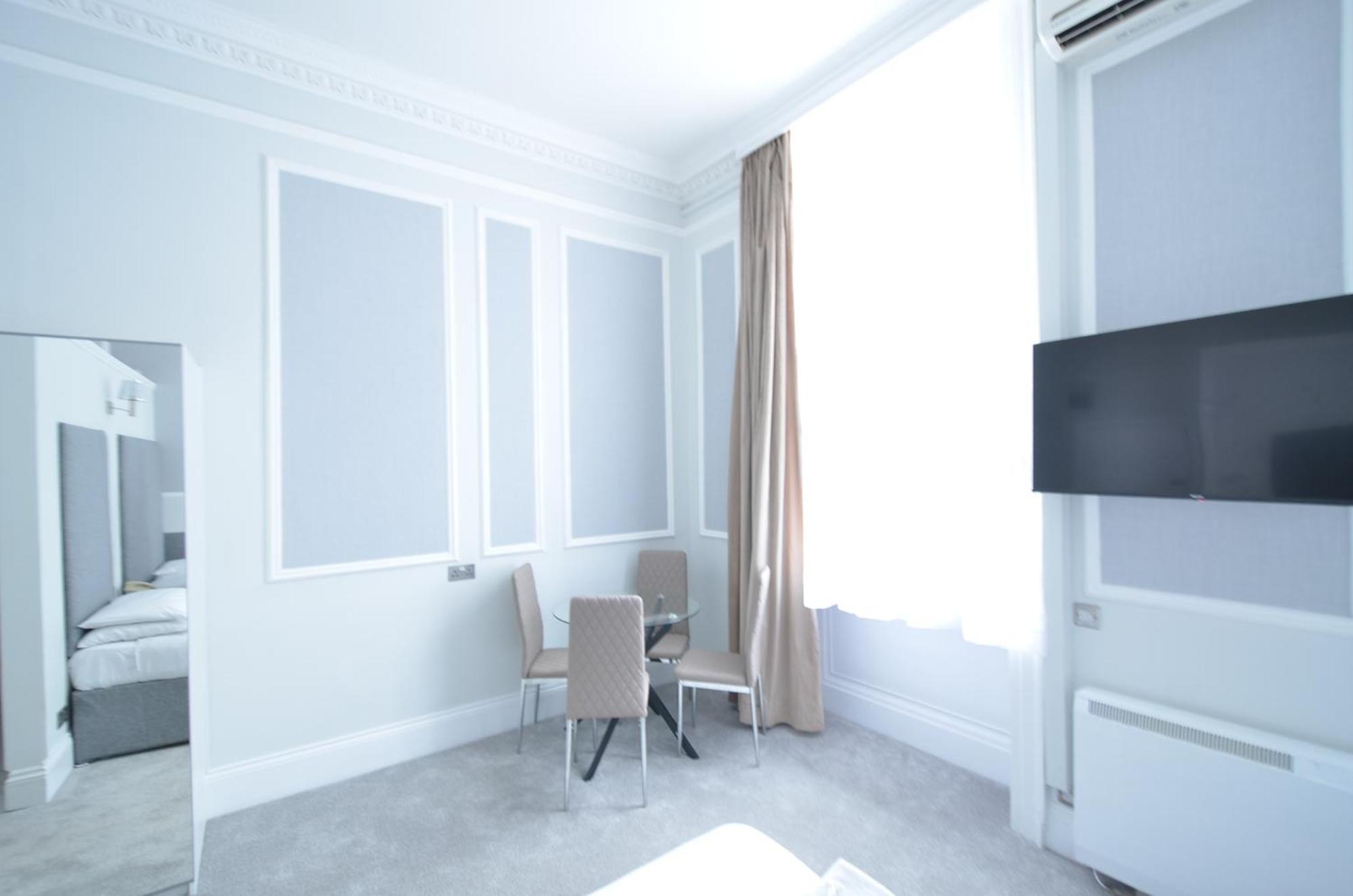 Amber Residence Hotel-Suites Londen Kamer foto