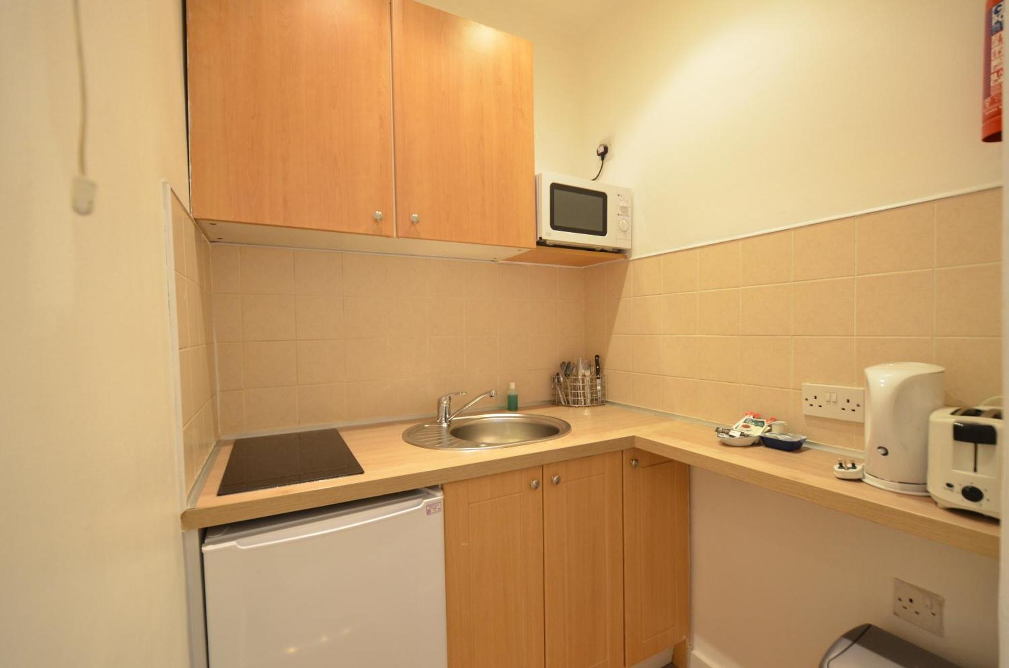 Amber Residence Hotel-Suites Londen Kamer foto