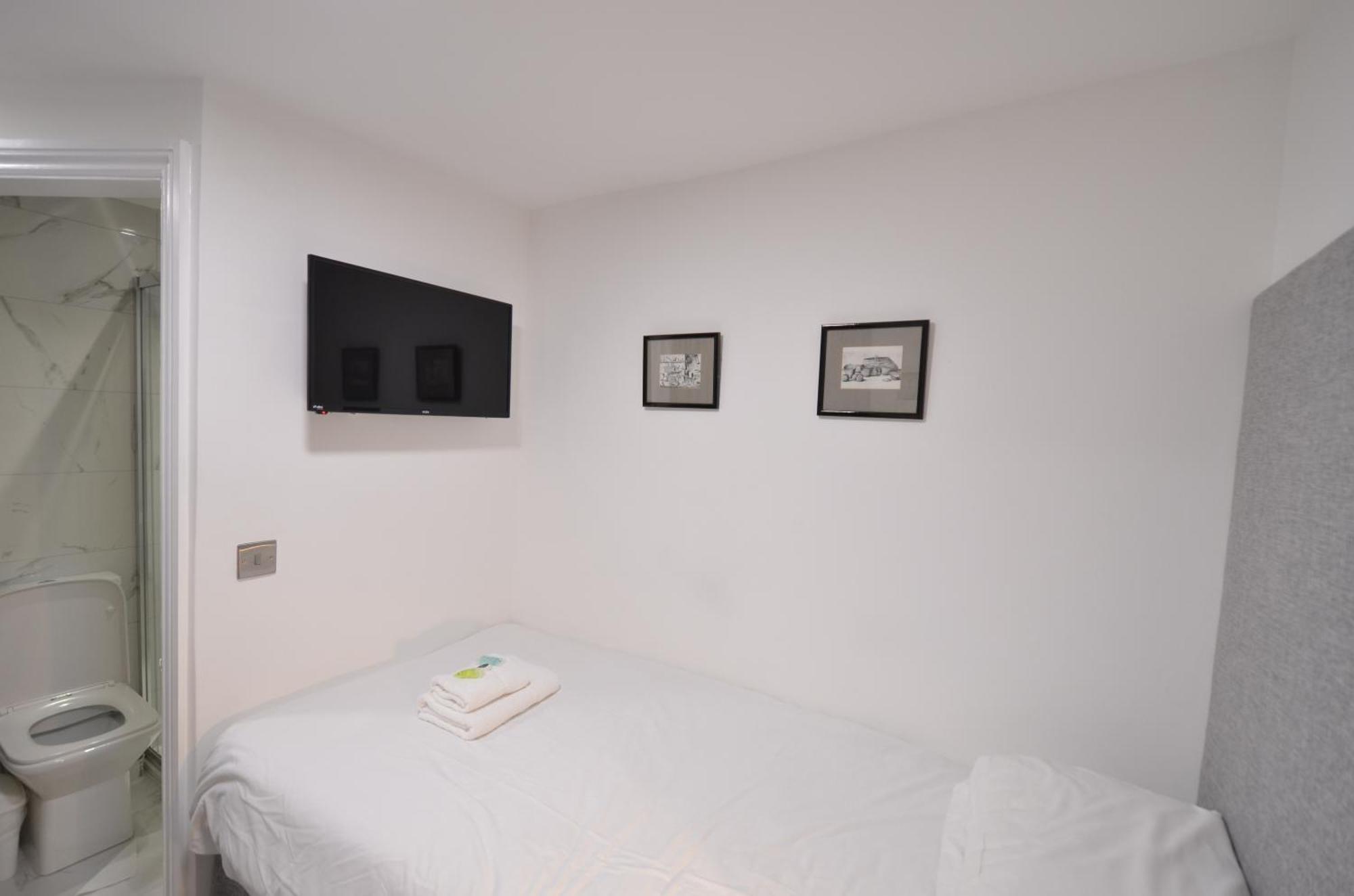 Amber Residence Hotel-Suites Londen Kamer foto