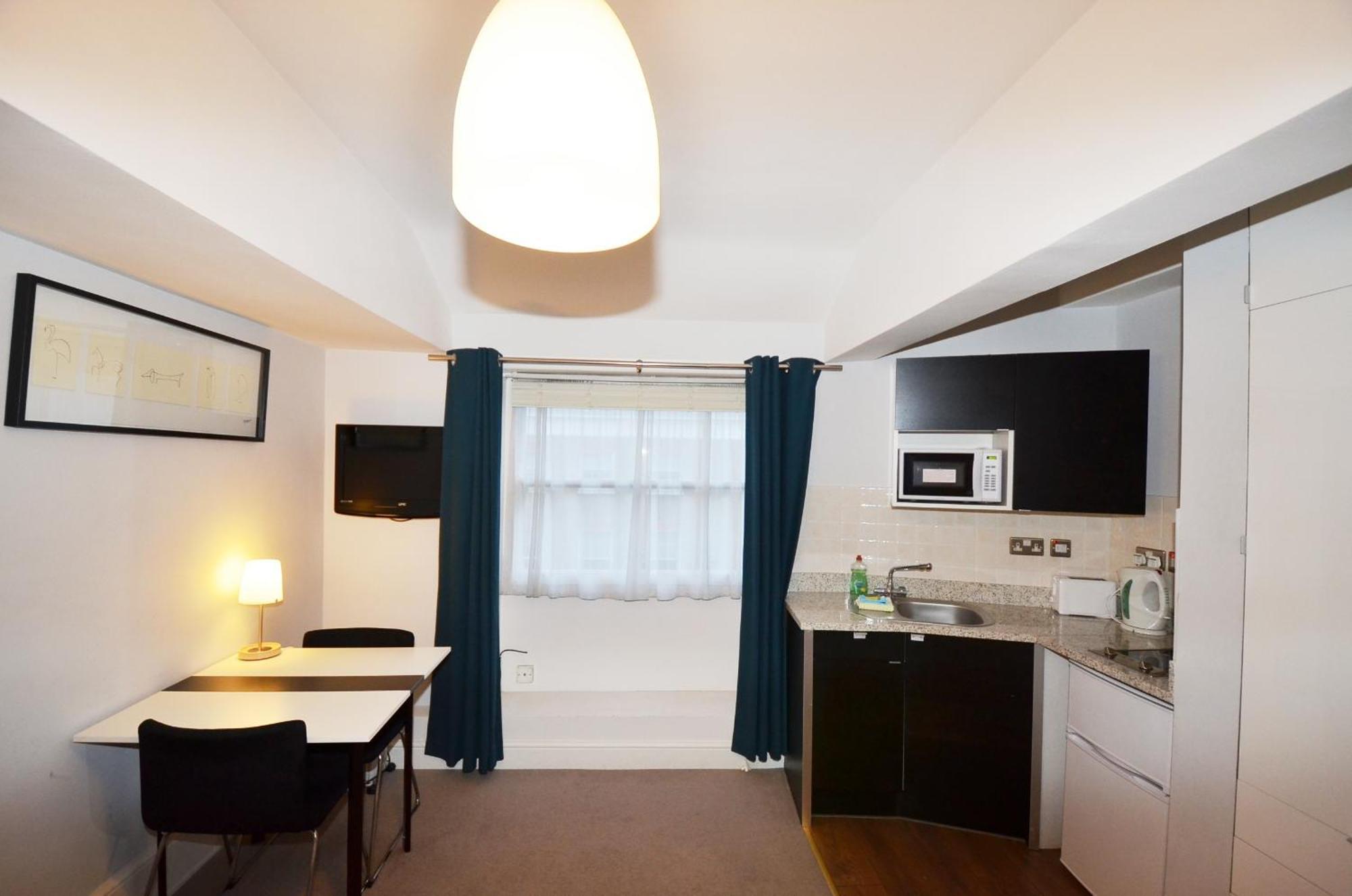 Amber Residence Hotel-Suites Londen Kamer foto
