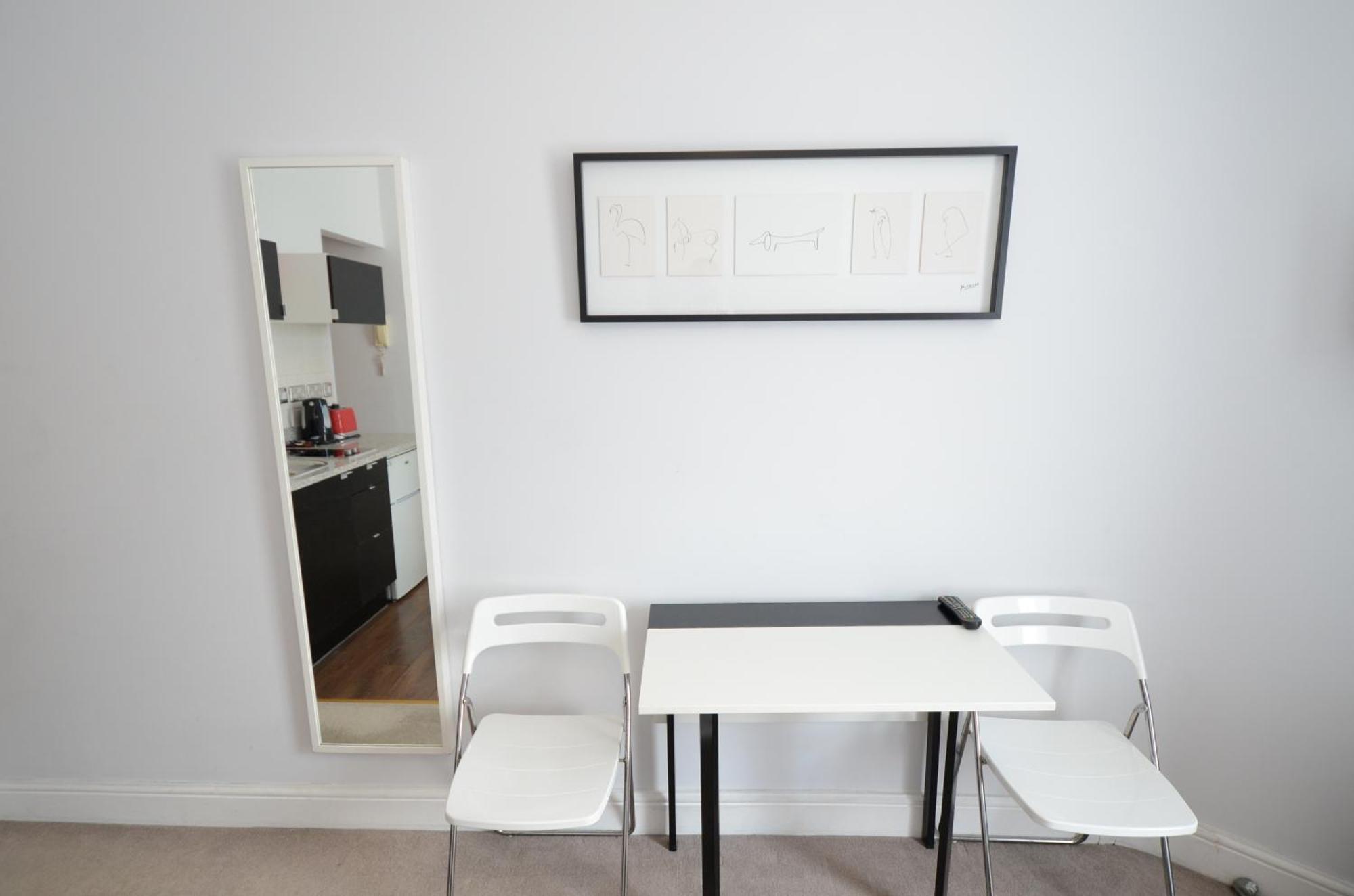 Amber Residence Hotel-Suites Londen Kamer foto